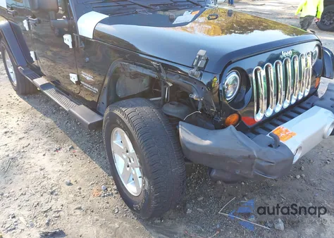 2010 Jeep Wrangler Unlimited Sahara z USA, uszkodzony, nr VIN 1J4BA5H13AL225975